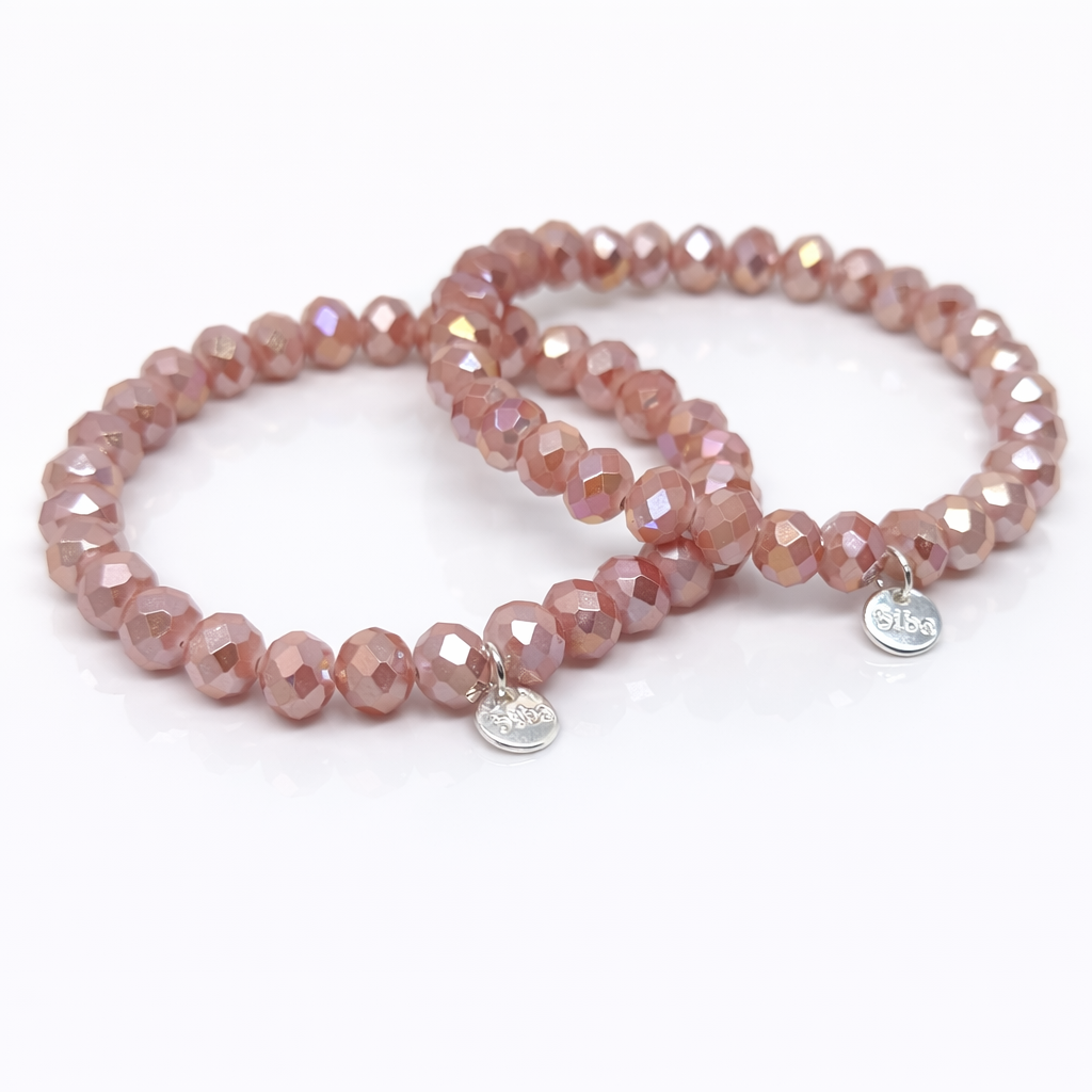 biba Crystal Armband in Rosé mit facettierten Kristallperlen und Metallanhänger