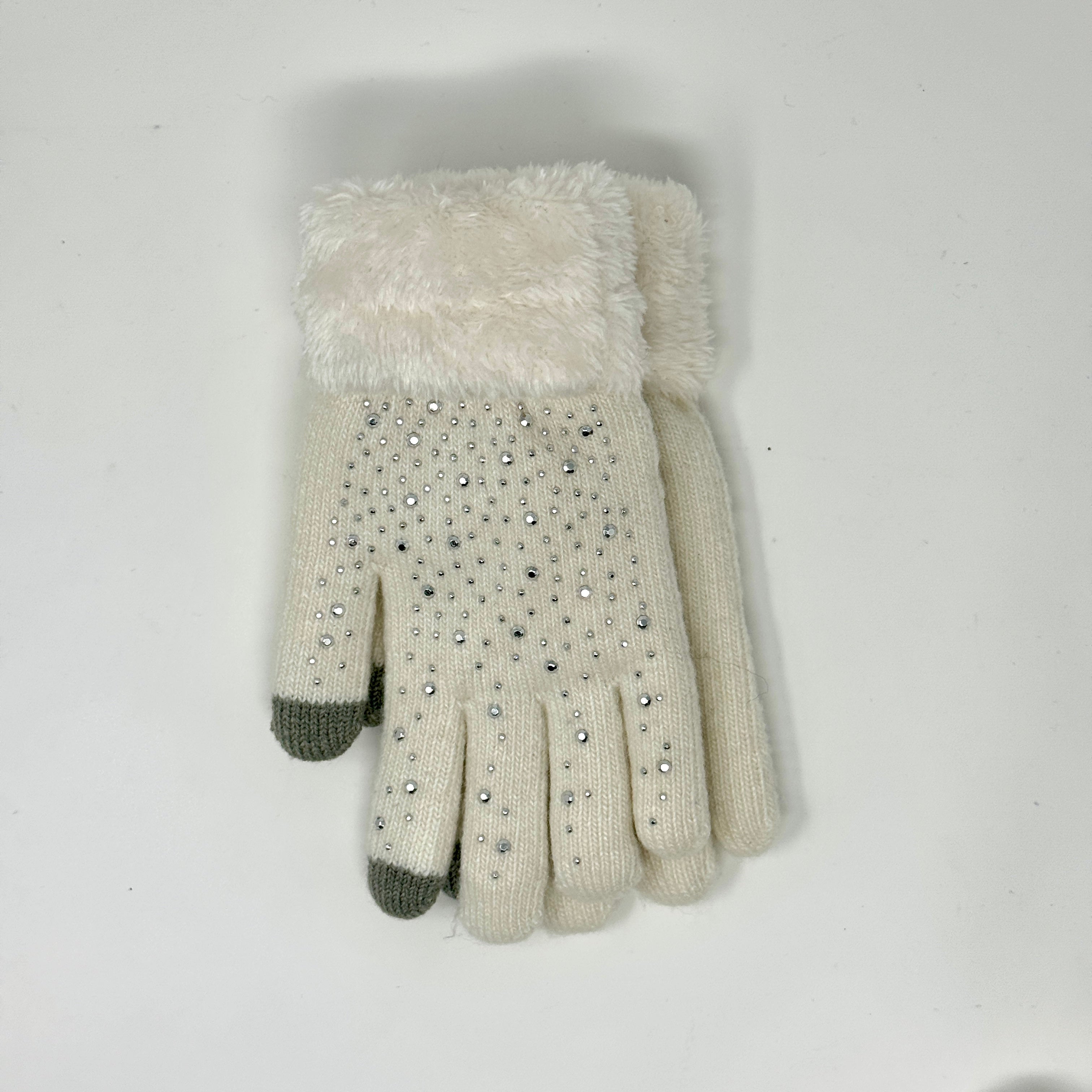 Glitzer-Handschuhe mit Teddyfellbesatz in Cremeweiß.