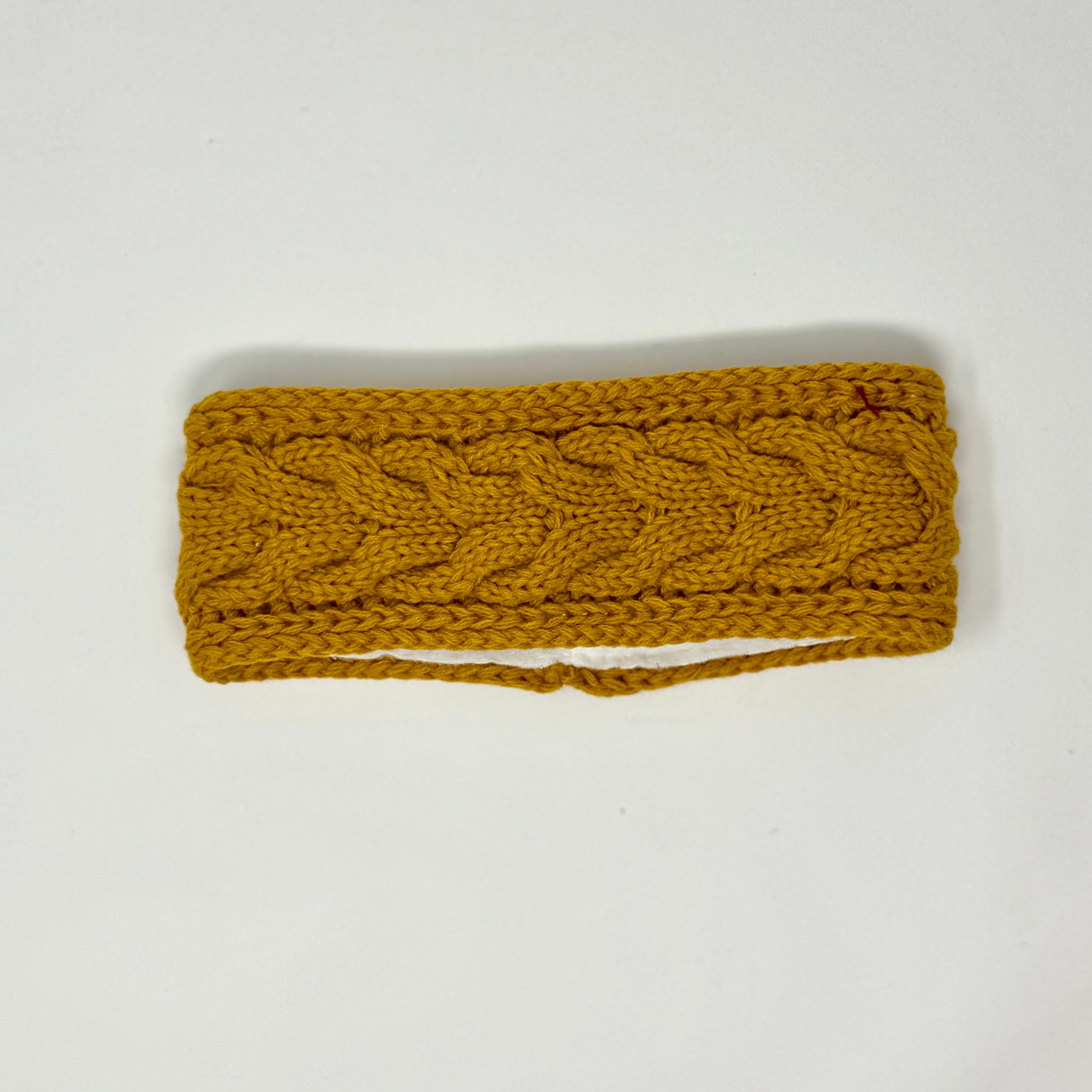 Gestricktes Stirnband in Senfgelb mit Zopfmuster