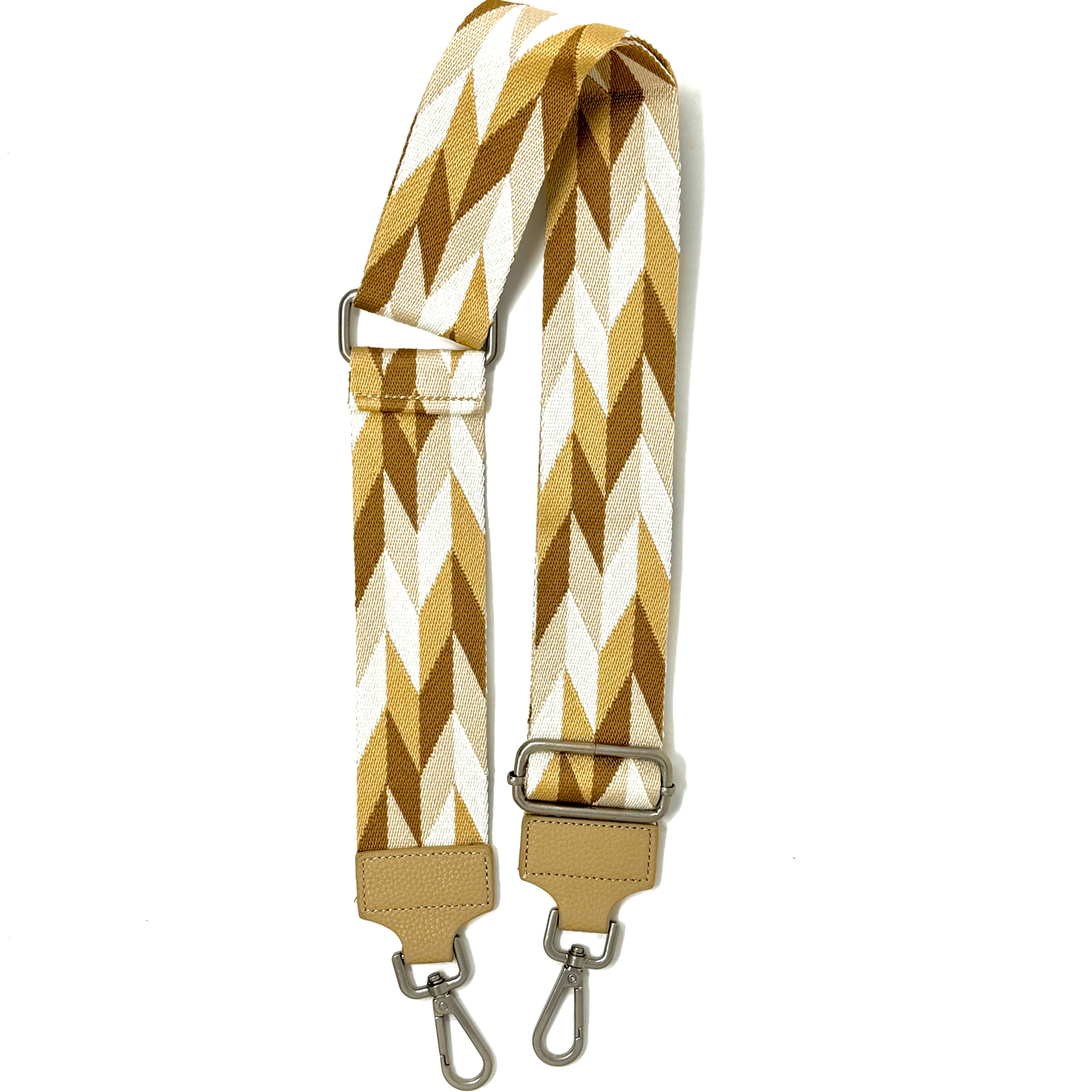 Verstellbarer Schulterriemen mit beige-weißem Muster und Karabinerhaken