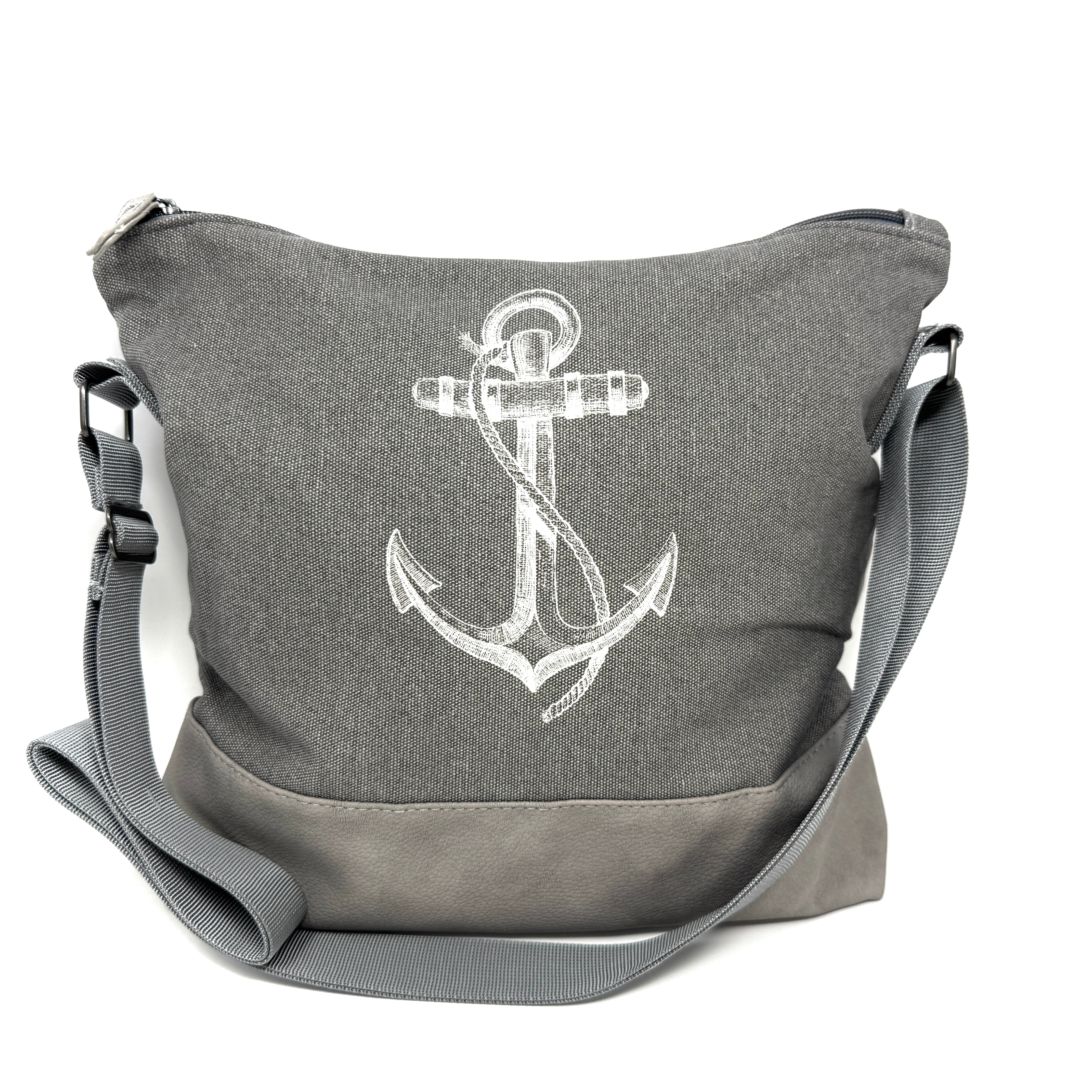 Moderne Umhängetasche aus wasserabweisender Baumwolle mit stilvollen Veggie-Leder-Details und Anker-Design
