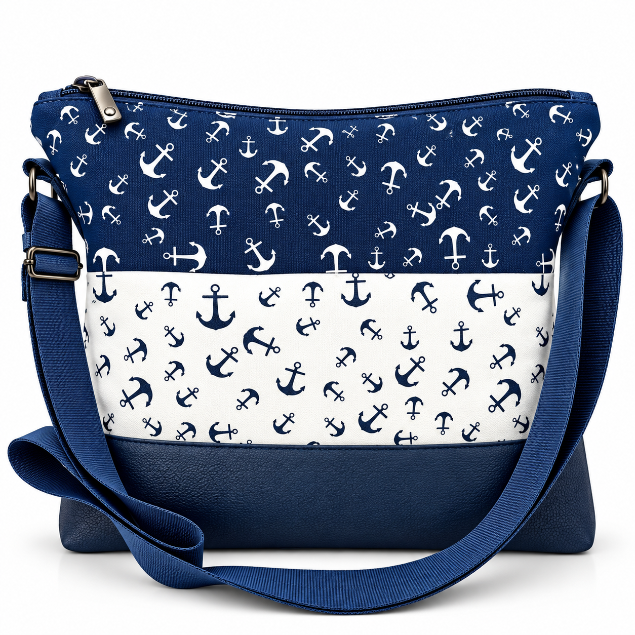 Marineblaue vegane Umhängetasche Ankertraum mit weiß-blauem Ankermuster, dunkelblauem Taschenboden und verstellbarem Schultergurt.