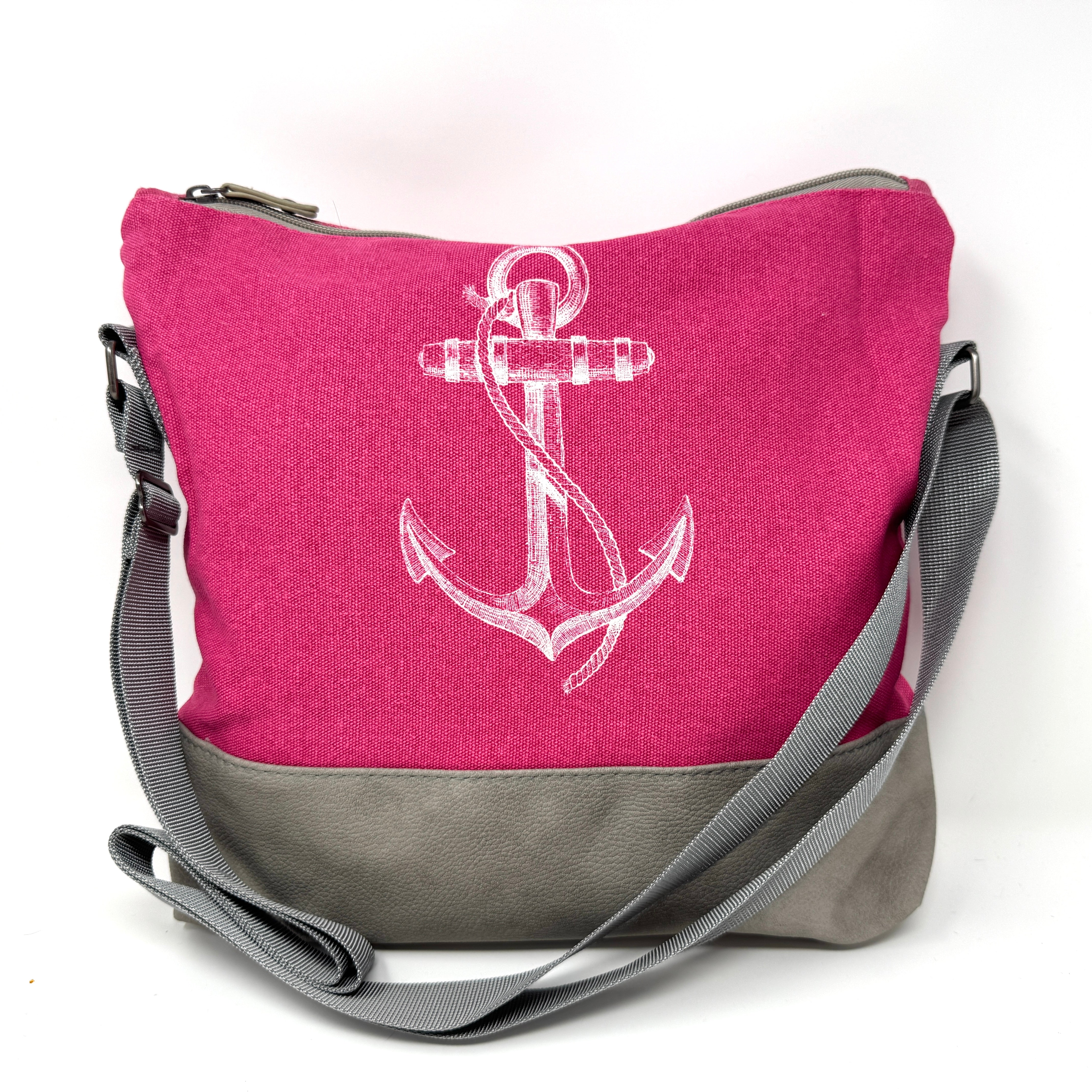 Moderne Umhängetasche in pink aus wasserabweisender Baumwolle mit stilvollen Veggie-Leder-Details und Anker-Design